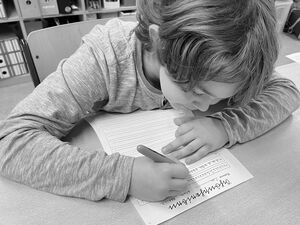 Schulkinder beim Projekt Schule früher